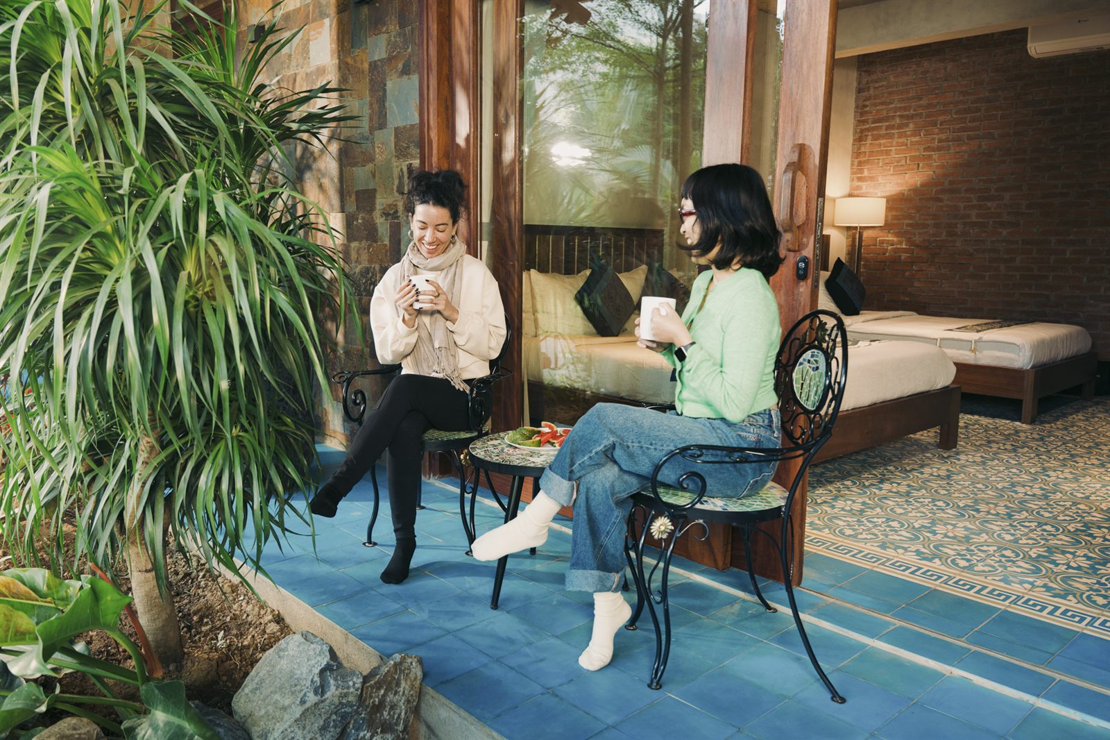 Two people having coffee on a terrace